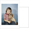 1950s 1960s winsome sad little girl sitting hugging a cocker spaniel puppy studio by Anonymous