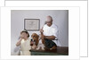 1960s little girl hiding eyes with as pet basset hound gets injection from veterinarian by Anonymous