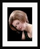 1960s portrait serious woman black sequin evening diamond earrings dress bouffant hairstyle looking at camera by Anonymous