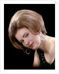 1960s portrait serious woman black sequin evening diamond earrings dress bouffant hairstyle looking at camera by Anonymous