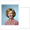 1960s portrait smiling blond woman wearing a red white checked blouse by Anonymous