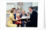 1960s three generation family with birthday cake by Anonymous