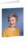 1960s portrait smiling elderly woman wearing orange top laughing looking to side by Anonymous