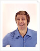 1970s man portrait head shoulders blue shirt laughing toothy smile by Anonymous