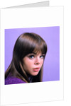 1960s portrait young brunette woman teen head shoulders purple background by Anonymous