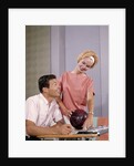 1960s couple husband wife bowling checking the score indoor by Anonymous