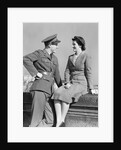 1940s happy couple man wearing army uniform woman sitting on stone wall by Anonymous