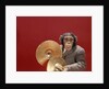 1960s chimpanzee wearing suit and tie playing cymbals by Anonymous