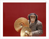 1960s chimpanzee wearing suit and tie playing cymbals by Anonymous