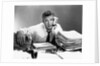1950s portrait man overworked with desk full of papers by Anonymous