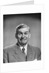 1950s mature middle aged man smiling business suit tie happy amused funny face expression by Anonymous