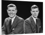1950s double exposure of man with a smile and a frown wearing a suit by Anonymous