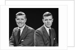 1950s double exposure of man with a smile and a frown wearing a suit by Anonymous