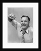 1940s 1950s portrait of man in shirt and tie holding handkerchief smiling by Anonymous