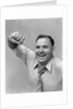 1940s 1950s portrait of man in shirt and tie holding handkerchief smiling by Anonymous