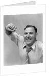 1940s 1950s portrait of man in shirt and tie holding handkerchief smiling by Anonymous