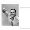 1940s 1950s portrait of man in shirt and tie holding handkerchief smiling by Anonymous