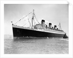 1930s 1936 maiden voyage of queen mary dwarfing small tugboat moving alongside it by Anonymous