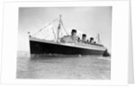 1930s 1936 maiden voyage of queen mary dwarfing small tugboat moving alongside it by Anonymous