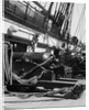 1930s row of cannon breeches on gun deck of sailing naval ship of war by Anonymous