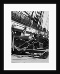 1930s row of cannon breeches on gun deck of sailing naval ship of war by Anonymous