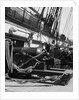 1930s row of cannon breeches on gun deck of sailing naval ship of war by Anonymous