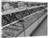 1950s grocery store meat section by Anonymous