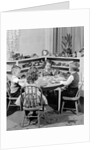 1950s 4 pre-school age children seated at small round table putting together jigsaw puzzle by Anonymous