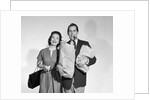 1950s couple smiling woman man carrying grocery bags smoking cigar looking at camera by Anonymous