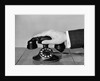 1930s 1940s man's hand on telephone by Anonymous