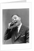 1930s man in suit laughing talking on telephone by Anonymous