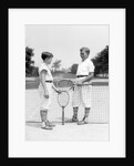 1920s 1930s two boys tennis match holding rackets measuring net height by Anonymous