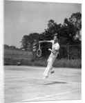 1930s man playing tennis jumping mid air action by Anonymous