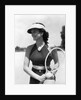 1930s woman in polka dot halter top shorts & sun visor holding a tennis ball & racket by Anonymous