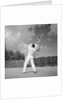 1930s back view of man playing tennis about to hit the ball summer outdoor by Anonymous