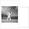 1930s back view of man playing tennis about to hit the ball summer outdoor by Anonymous