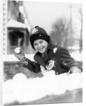 1920s 1930s smiling boy about to throw toss snowball playing snow fun winter cold mischief looking at camera by Anonymous