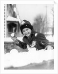 1920s 1930s smiling boy about to throw toss snowball playing snow fun winter cold mischief looking at camera by Anonymous
