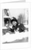 1920s 1930s smiling boy about to throw toss snowball playing snow fun winter cold mischief looking at camera by Anonymous
