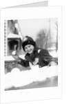 1920s 1930s smiling boy about to throw toss snowball playing snow fun winter cold mischief looking at camera by Anonymous