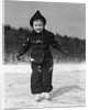 1930s worried cautious little girl on ice skates looking at camera by Anonymous