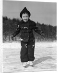 1930s worried cautious little girl on ice skates looking at camera by Anonymous