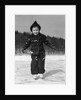 1930s worried cautious little girl on ice skates looking at camera by Anonymous