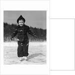 1930s worried cautious little girl on ice skates looking at camera by Anonymous