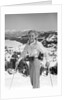 1940s 1950s young blond athletic woman looking at camera smiling standing with ski poles top of mountain by Anonymous