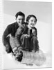 1920s 1930s smiling couple man and woman on toboggan in winter by Anonymous
