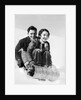 1920s 1930s smiling couple man and woman on toboggan in winter by Anonymous