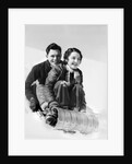 1920s 1930s smiling couple man and woman on toboggan in winter by Anonymous