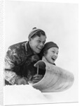 1930s couple on toboggan laughing by Anonymous