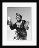 1930s smiling young woman covered in snow throwing piece of snow squinting looking at camera by Anonymous